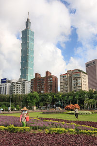 View of city against cloudy sky