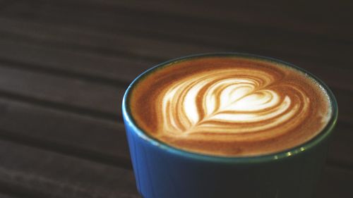 High angle view of cappuccino on table