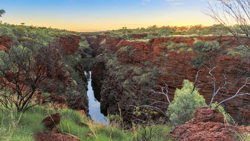 Scenic view of river against clear sky