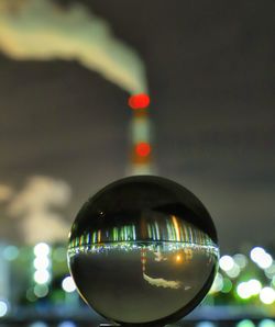 Close-up of illuminated christmas lights at night