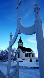 Low angle view of church against blue sky