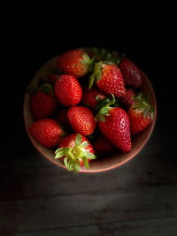 Close-up of strawberries in bowl on table
