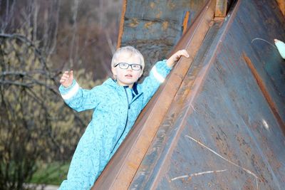 Portrait of boy on metal