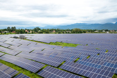 Rows of photovoltaic panels at a solar farm in nepal.