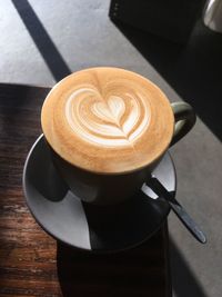 High angle view of cappuccino on table