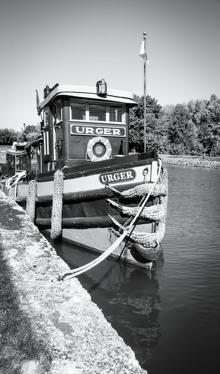 transportation, nautical vessel, mode of transport, boat, moored, clear sky, water, day, outdoors, damaged, no people, waterfront, obsolete, tranquility, tranquil scene, harbor