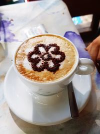 Cup of coffee on table