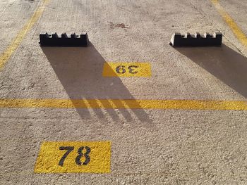 High angle view of numbers in parking lot