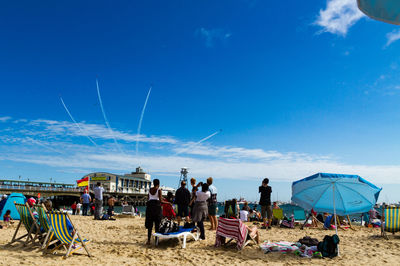 Crowd at sandy beach