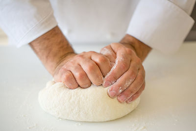 Close-up of hand holding ice cream