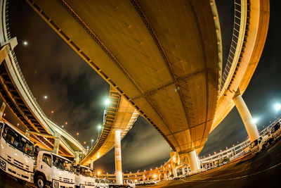 Low angle view of illuminated bridge