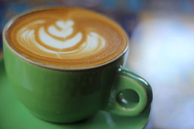 Close-up of cappuccino on table