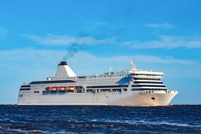 Ship in sea against sky