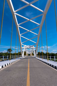 Bridge over road against sky