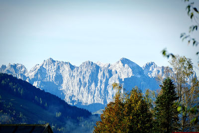 Scenic view of snowcapped mountains against sky