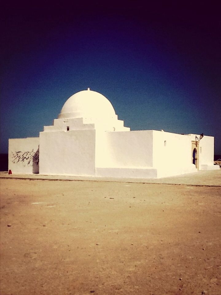 built structure, architecture, building exterior, clear sky, copy space, blue, place of worship, religion, dome, low angle view, white color, sunlight, history, famous place, islam, arch, day, spirituality, travel destinations, tourism