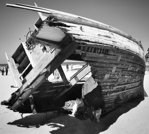 Abandoned boat in river