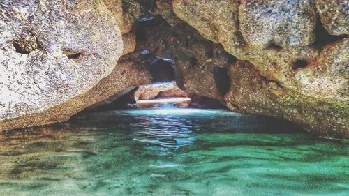 Scenic view of rock formation in sea