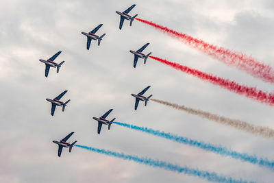 Low angle view of airplane flying in sky