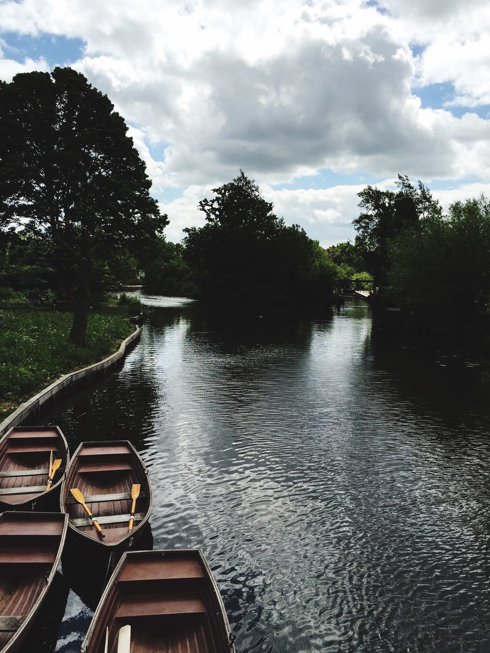 tree, water, sky, cloud - sky, river, lake, tranquility, cloudy, cloud, tranquil scene, nature, reflection, waterfront, rippled, transportation, scenics, beauty in nature, outdoors, day, canal