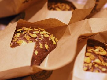 Close-up of sweet breads in paper bags