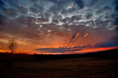 Scenic view of dramatic sky during sunset