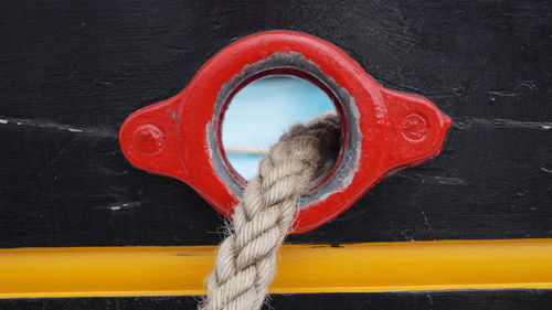 Close-up of rope tied on long tall ship boat