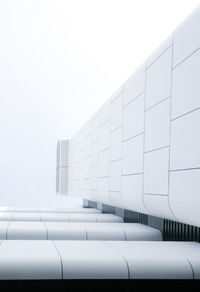 Low angle view of modern building against clear sky