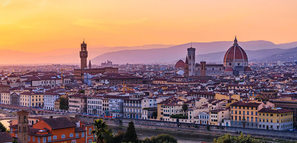 High angle view of townscape against sky during sunset