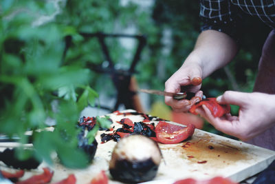 Close-up of man preparing food