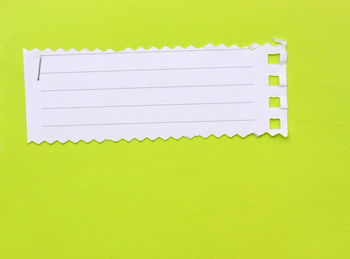 Blank paper against green background