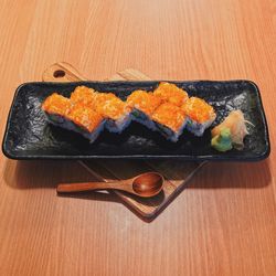 Close-up of sushi served on table