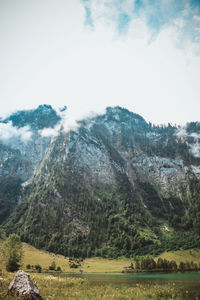 Scenic view of mountains and lake against sky