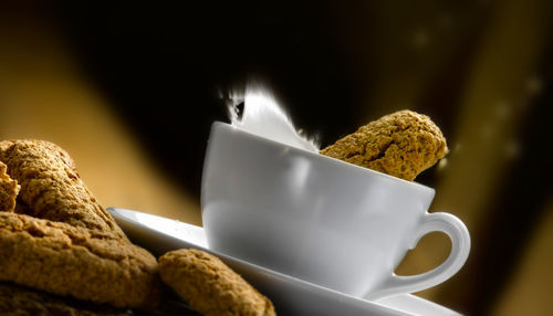 Close-up of coffee cup on table