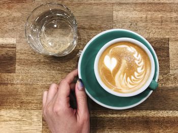 Directly above shot of coffee cup on table