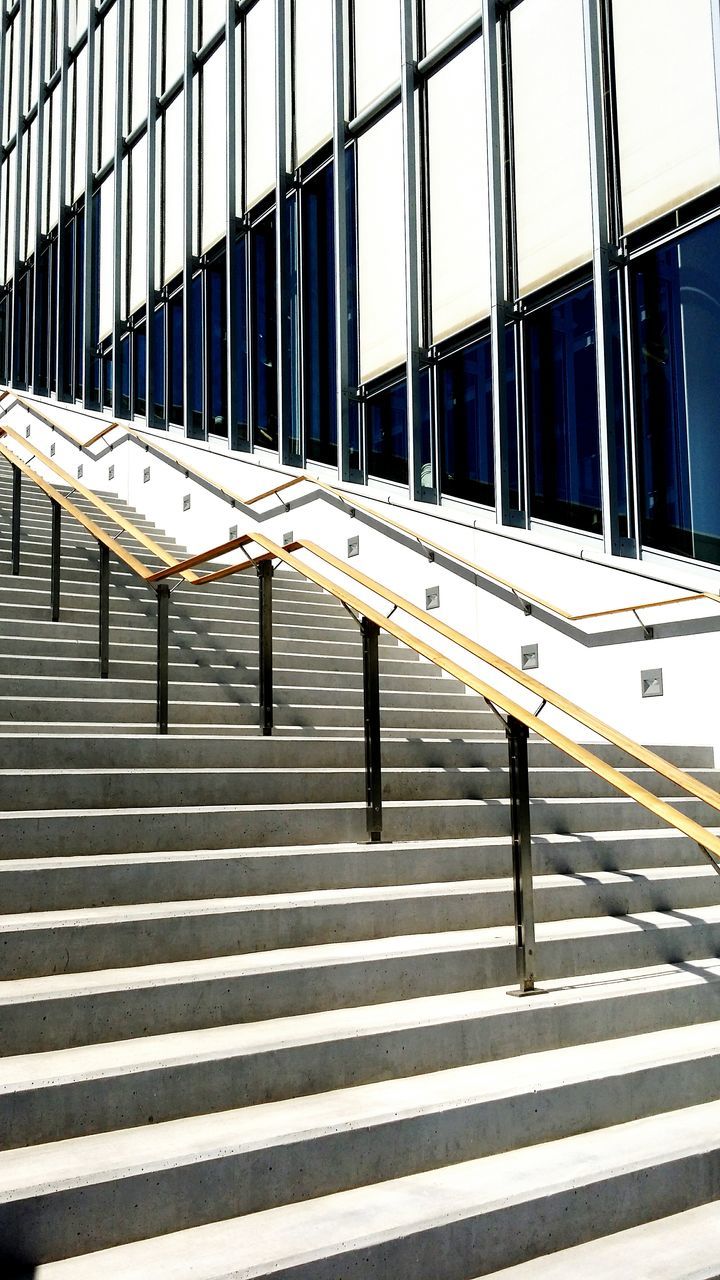 transportation, architecture, built structure, sign, pattern, day, no people, outdoors, sunlight, shadow, mode of transportation, travel, nature, airport, staircase, window, building exterior, airplane, air vehicle, glass - material