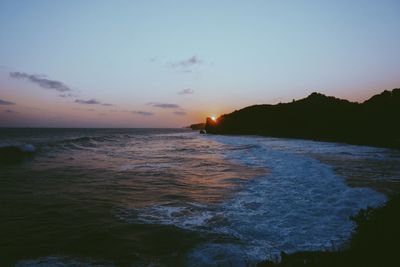 Scenic view of sea against sky during sunset