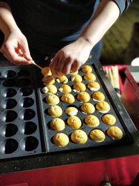 High angle view of person preparing food