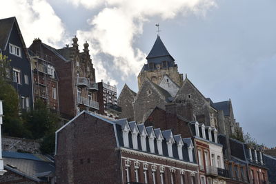 Low angle view of buildings against sky