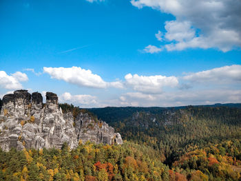 Scenic view of landscape against sky during autumn