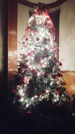 Illuminated christmas tree at home