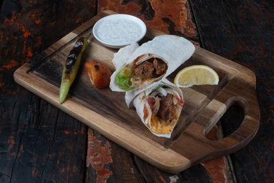 High angle view of serving food on table