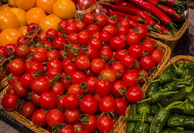 High angle view of tomatoes in market for sale