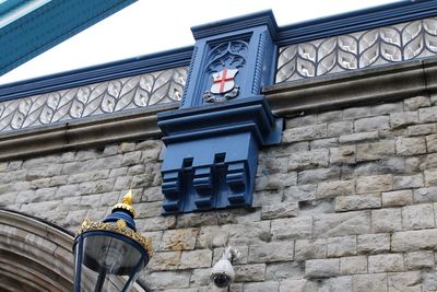 Low angle view of building against wall