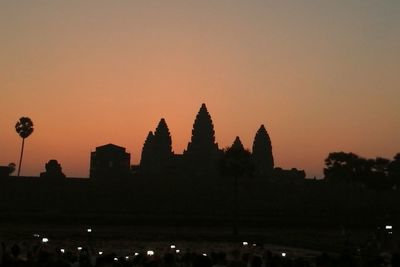 Silhouette of buildings at sunset