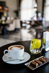 Coffee cup on table in cafe