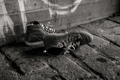 High angle view of shoes on wall