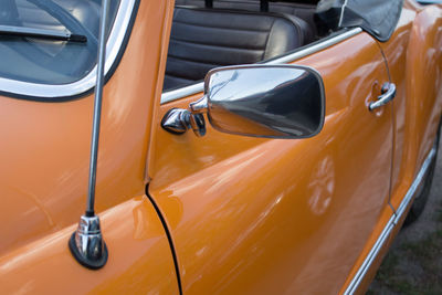 Close-up of car side-view mirror