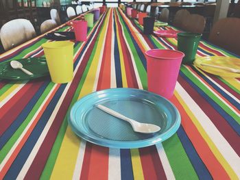 Close-up of multi colored pencils on table