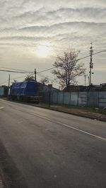 Road with buildings in background